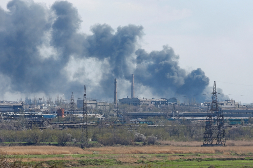 Smoke rises above a plant of Azovstal Iron and Steel Works company during Ukraine-Russia conflict in the southern port city of Mariupol, Ukraine April 20, 2022. Reuters/Alexander Ermochenko