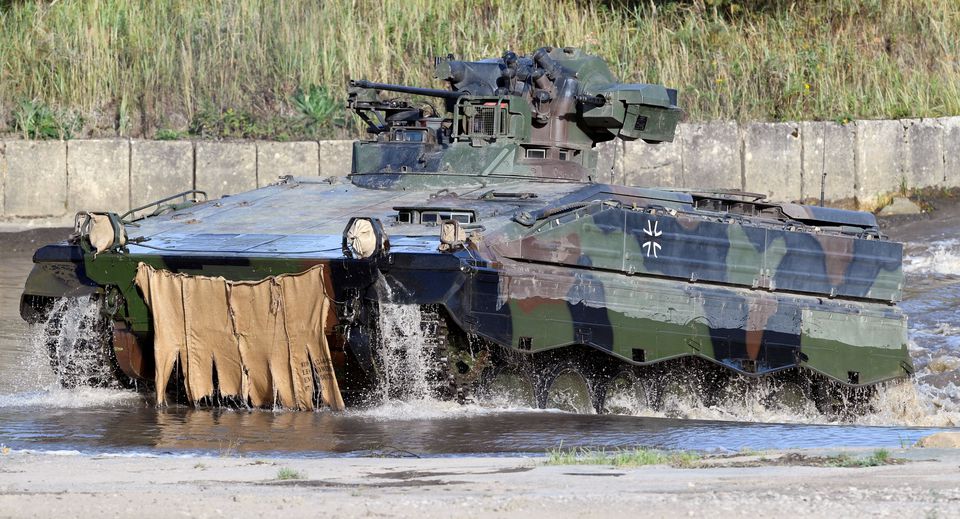 A Marder armoured infantry fighting vehicle of the German army Bundeswehr takes part in an exercise during a media day in Munster, Germany, September 28, 2018. REUTERS/Fabian Bimmer/File Photo