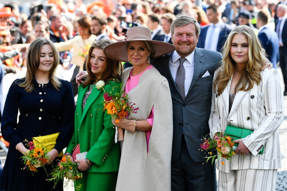 King Willem-Alexander and Queen Maxima of the Netherlands pose with their daughters, Princess Ariane, Princess Alexia and Princess Catharina-Amalia, during King's Day (Koningsdag), in Maastricht, Netherlands, April 27, 2022. REUTERS/Piroschka van de Wouw
 
