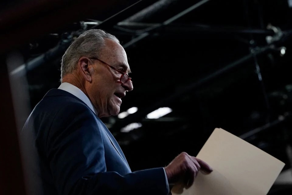 FILE PHOTO - U.S. Senate Majority Leader Chuck Schumer (D-NY) speaks during a news conference about legislative efforts to lower gas prices, on Capitol Hill in Washington, U.S., April 28, 2022. REUTERS/Elizabeth Frantz

