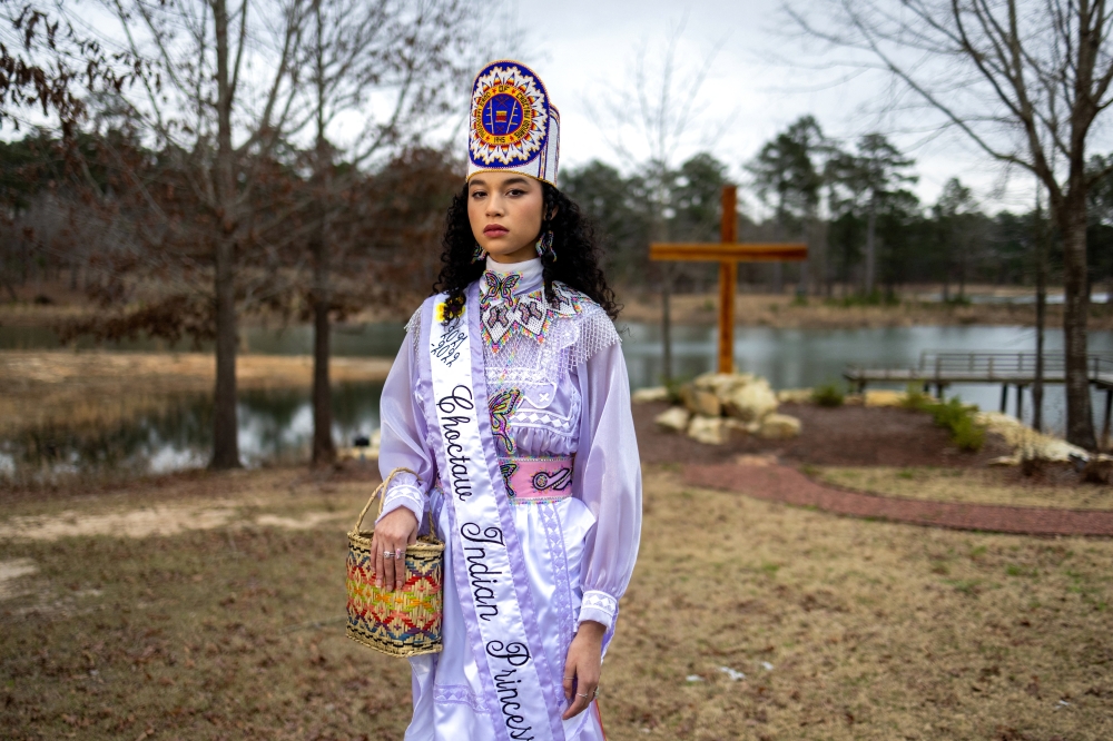 Choctaw Indian Princess Shemah Crosby poses for a photo at Lake Pushmataha where the Mississippi Band of Choctaw Indians erected a COVID-19 memorial in March of 2021. (REUTERS/Kathleen Flynn)