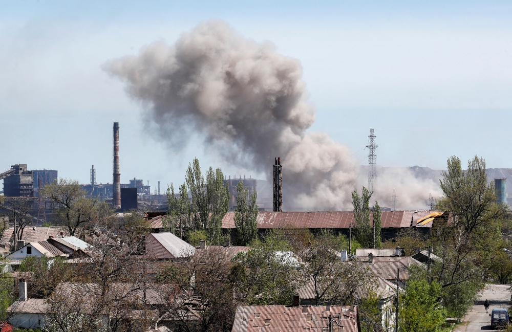 A view shows an explosion at a plant of Azovstal Iron and Steel Works during Ukraine-Russia conflict in the southern port city of Mariupol, Ukraine May 8, 2022. REUTERS/Alexander Ermochenko/File Photo