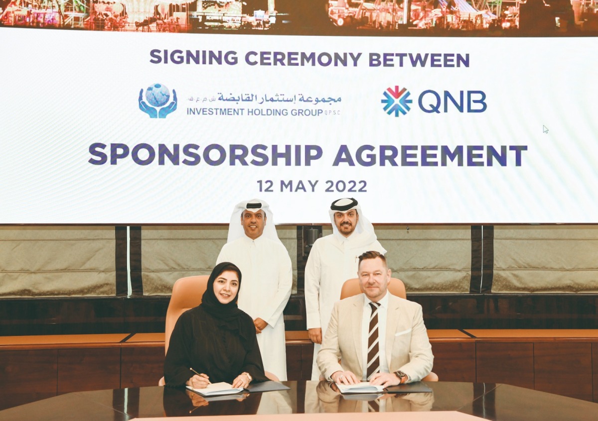  Abdulla Mubarak Al Khalifa Group Chief Executive Officer of QNB; Moutaz Al Khayyat, Chairman of IHG; Heba Al Tamimi, Group Communications General Manager of QNB, and Henrik Christiansen, Group Chief Executive Officer of IHG during the agreement signing ceremony.