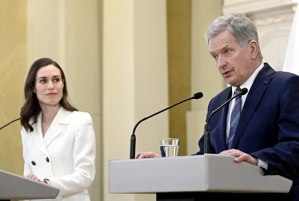 Finland's Prime Minister Sanna Marin and Finland's President Sauli Niinisto attend a joint news conference on Finland's security policy decisions at the Presidential Palace in Helsinki, Finland, May 15, 2022. Heikki Saukkomaa/ Lehtikuva/via Reuters 