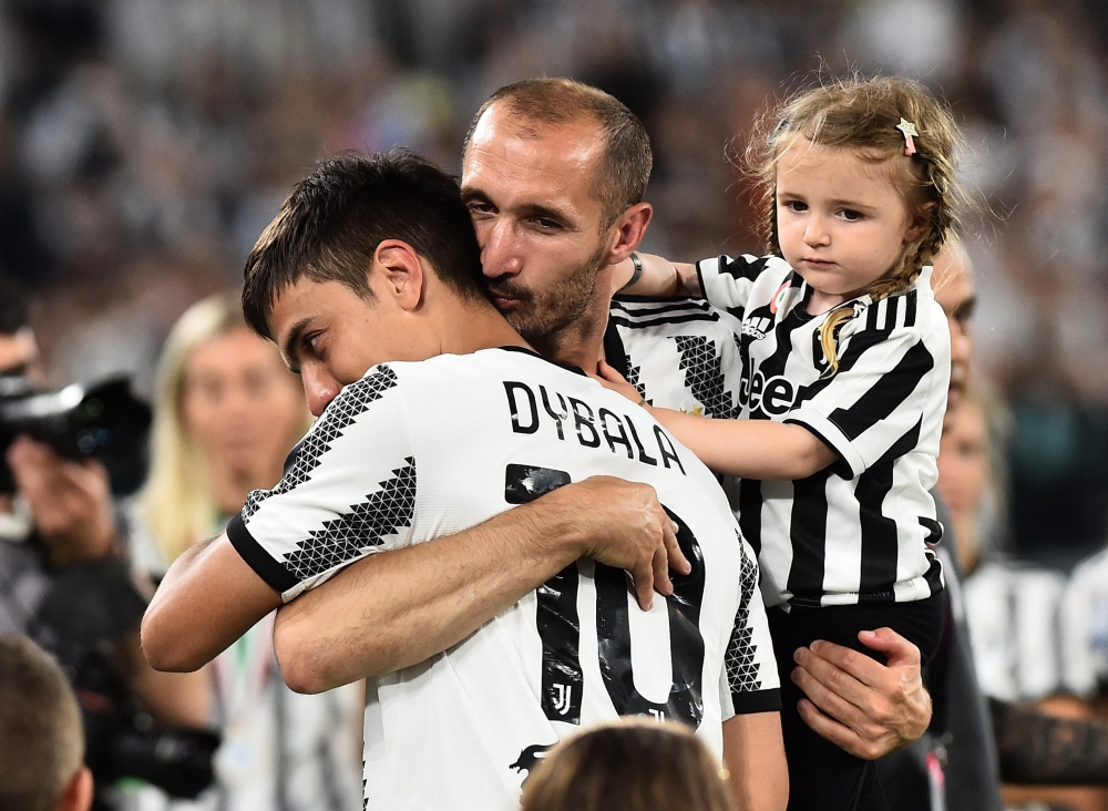 Juventus' Giorgio Chiellini and Paulo Dybala react after the match REUTERS/Massimo Pinca
