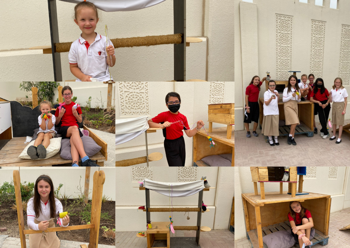 SISQ students showing the pet playground and exercise area using recycled materials that they have produced which was donated to Qatar Animal Welfare Society (QAWS). 