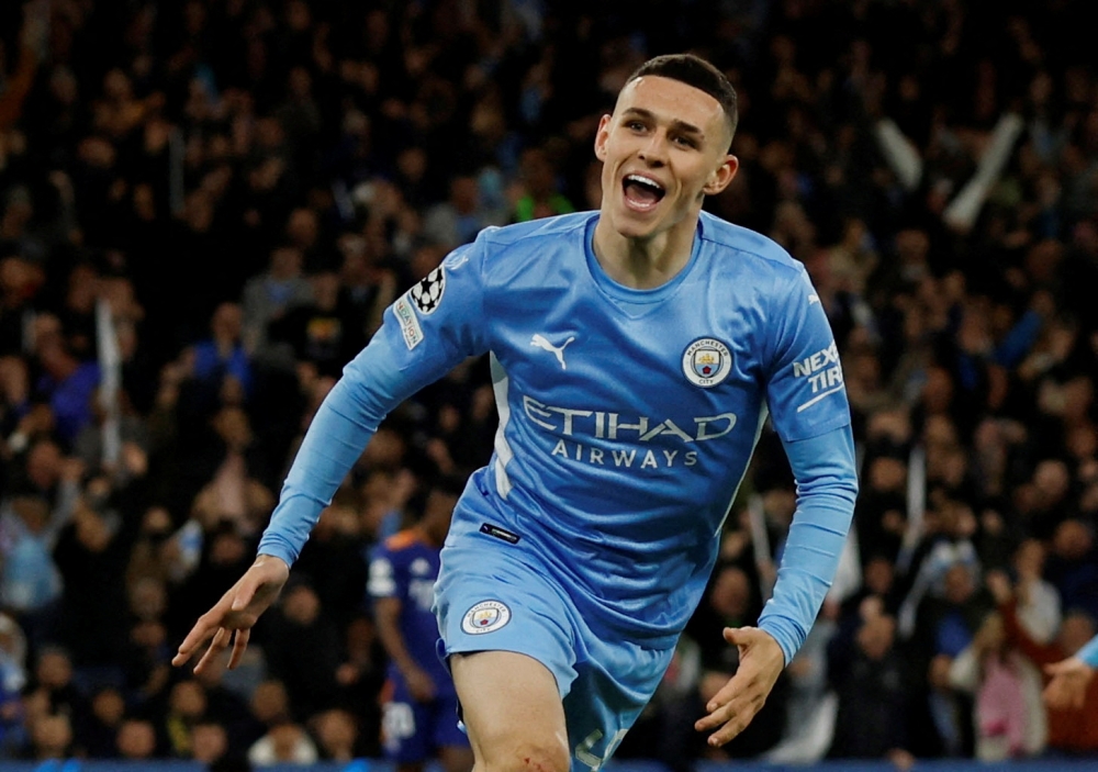 Manchester City's Phil Foden celebrates scoring their third goal Reuters/Jason Cairnduff/File Photo