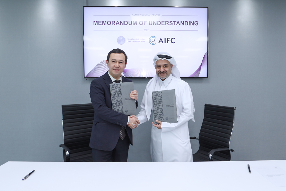 Yousuf Mohamed Al Jaida (right), Chief Executive Officer, QFC during the agreement signing ceremony.