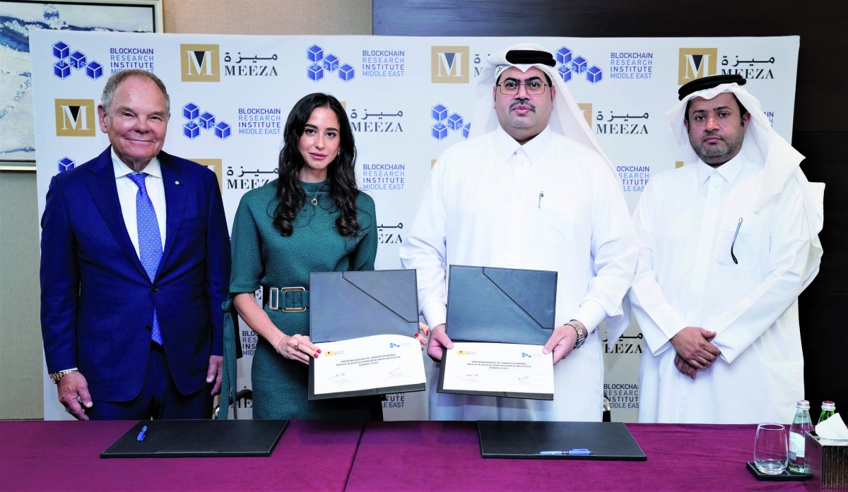 Officials from MEEZA and Blockchain Research Institute Middle East (BRIME) during the signing of the MoU on the sidelines of Blockchain Revolution Summit Qatar 2022, recently.  