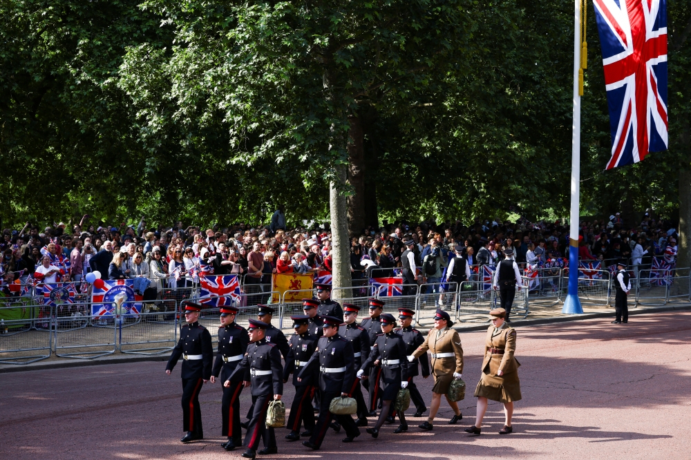 Members of the military march during the Queen's Platinum Jubilee celebrations at The Mall in London, Britain June 2, 2022. REUTERS/Henry Nicholls