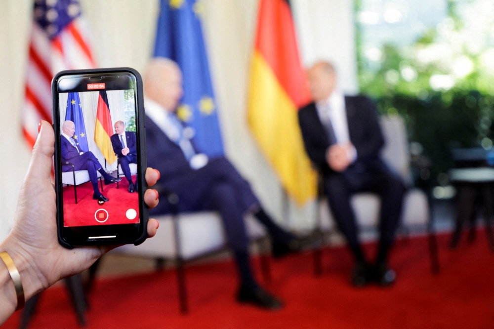German Chancellor Olaf Scholz meets U.S. President Joe Biden on the day of G7 leaders summit at Bavaria's Schloss Elmau castle, near Garmisch-Partenkirchen, Germany June 26, 2022. REUTERS/Leonhard Foeger