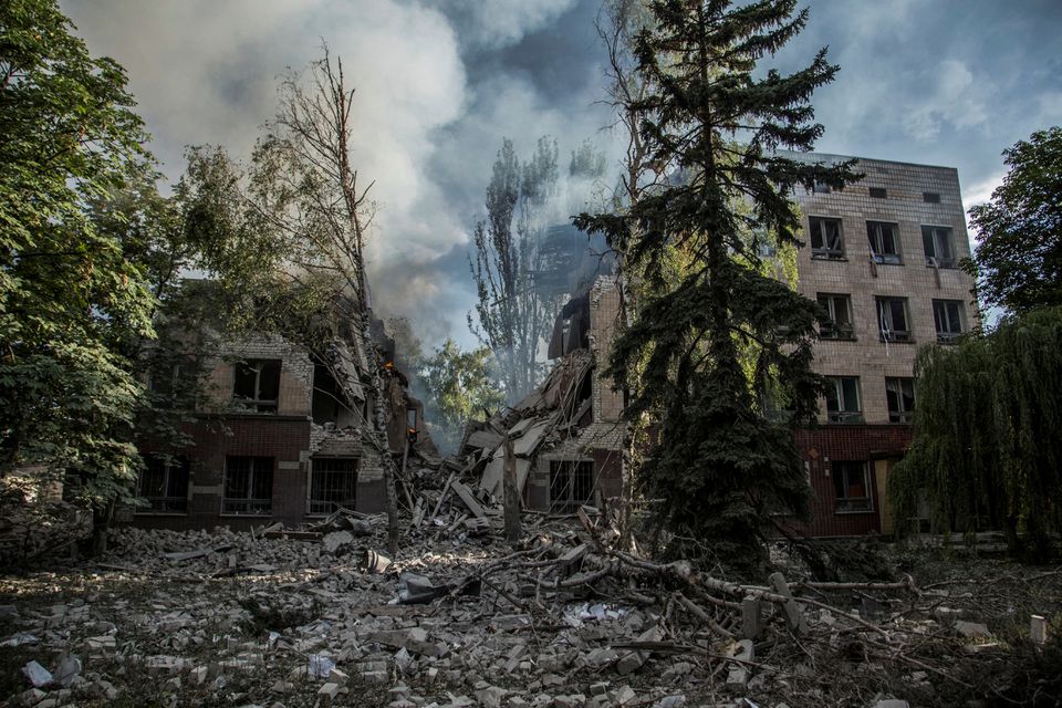 Smoke rises over the remains of a building destroyed by a military strike, as Russia's attack on Ukraine continues, in Lysychansk, Luhansk region, Ukraine June 17, 2022. REUTERS/Oleksandr Ratushniak/File Photo

