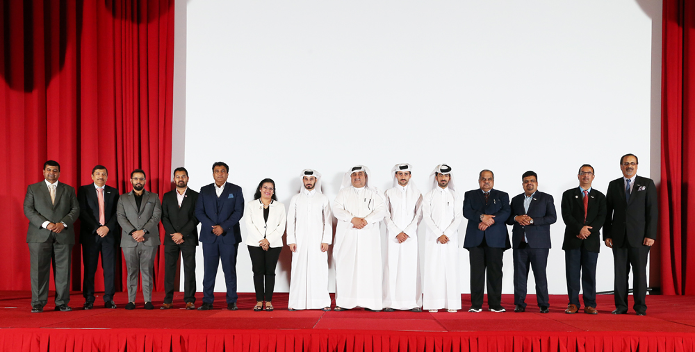 Officials pose for a group photo during the event.