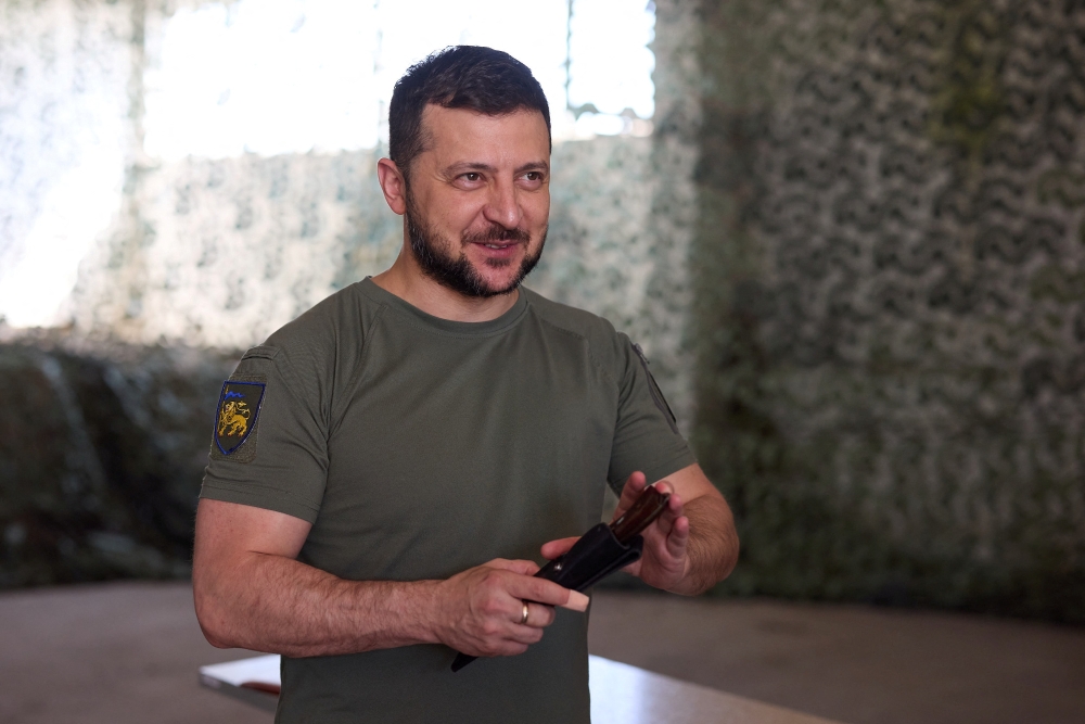 Ukraine's President Volodymyr Zelenskiy visits positions of Ukrainian service members in Dnipropetrovsk region, Ukraine on July 8, 2022. (Ukrainian Presidential Press Service)