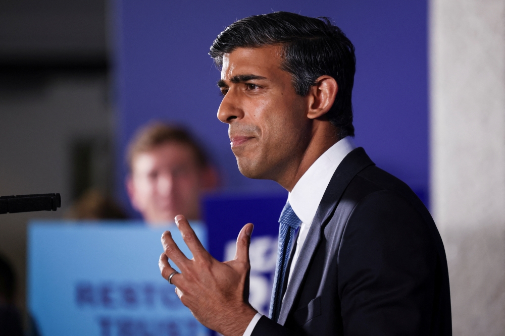 Former Chancellor of the Exchequer Rishi Sunak speaks to the media at an event to launch his campaign to be the next Conservative leader and Prime Minister, in London, Britain, July 12, 2022. REUTERS/Henry Nicholls