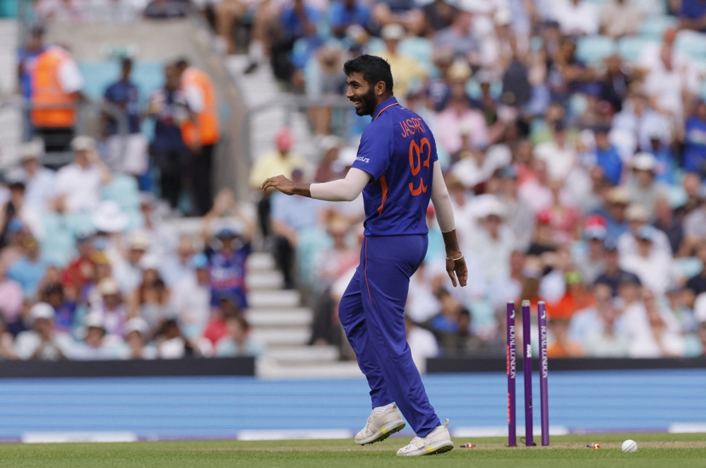 India's Jasprit Bumrah celebrates bowling out England's Liam Livingstone. (Reuters/Andrew Couldridge)