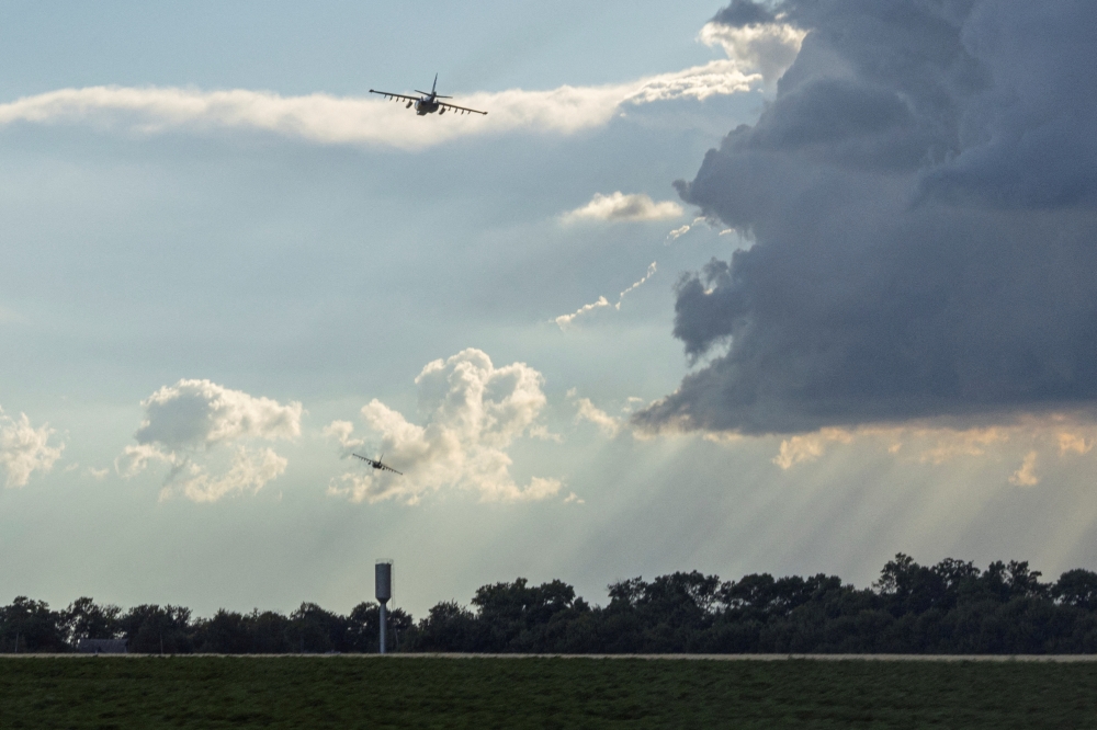 A pair of Ukrainian Su-25 jet fighters fly low, amid Russia's attack on Ukraine, near the town of Kramatorsk, in Donetsk region, Ukraine June 24, 2022. REUTERS/Marko Djurica/File Photo