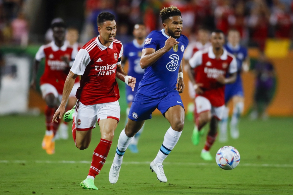 Jul 23, 2022; Orlando, FL, USA; Arsenal forward Gabriel Martinelli (11) runs with the ball ahead of Chelsea defender Reece James (24) during the first half at Camping World Stadium. Mandatory Credit: Sam Navarro-USA TODAY Sports