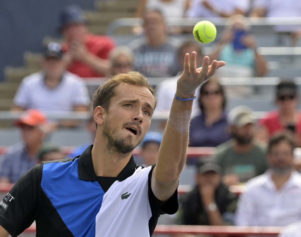 Aug 10, 2022; Montreal, QC, Canada; Daniil Medvedev serves against Nick Kyrgios (AUS) (not pictured) in second round play at IGA Stadium. Mandatory Credit: Eric Bolte-USA TODAY Sports