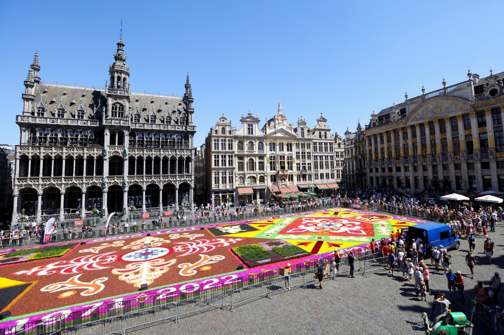 A view shows a 1,680 square meters flower carpet made with Belgian begonias, dahlias, grasses, barks and chrysanthemums at Brussels Grand Place, Belgium, August 12, 2022. (REUTERS/Johanna Geron)