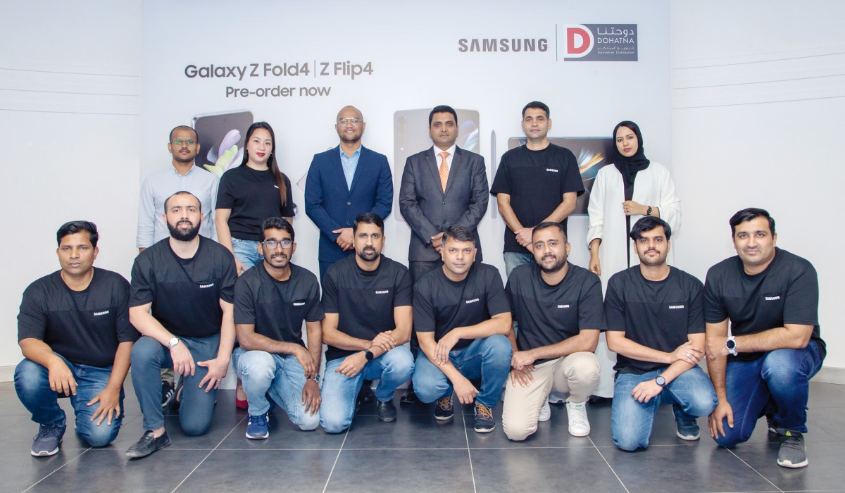Officials and staff during the pre-order launch announcement, in Doha, recently. 