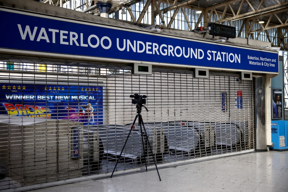 A view of a camera filming at Waterloo Underground Station, on the first day of national rail strike in London, Britain, June 21, 2022. REUTERS/Henry Nicholls/File Photo