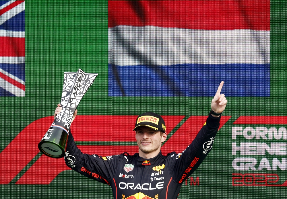 Red Bull's Max Verstappen celebrates on the podium with the trophy after winning the Dutch Grand Prix at the Circuit Zandvoort, in Zandvoort, Netherlands, on September 4, 2022. 
REUTERS/Yves Herman