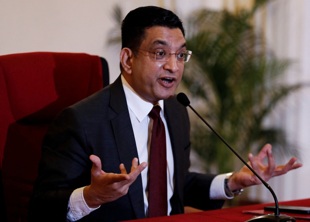 Sri Lanka Foreign Minister Ali Sabry attends a news conference to explain the country's stand on a resolution on its human rights situation which will be discussed at the U.N. Human Rights Council, amid the country's economic crisis, in Colombo, Sri Lanka, September 5, 2022. REUTERS/ Dinuka Liyanawatte