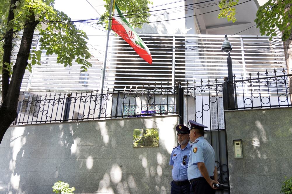 Police officers stands in front of the Embassy of the Islamic Republic of Iran in Tirana, Albania, September 7, 2022. REUTERS/Florion Goga