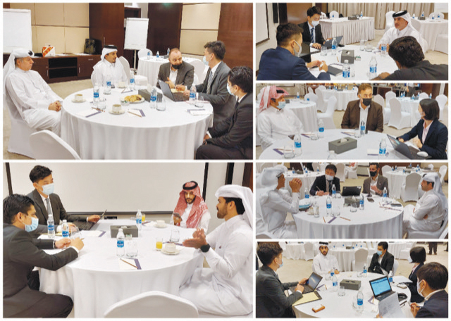 Experts from Toyota interact with customers in Qatar, during the event. 