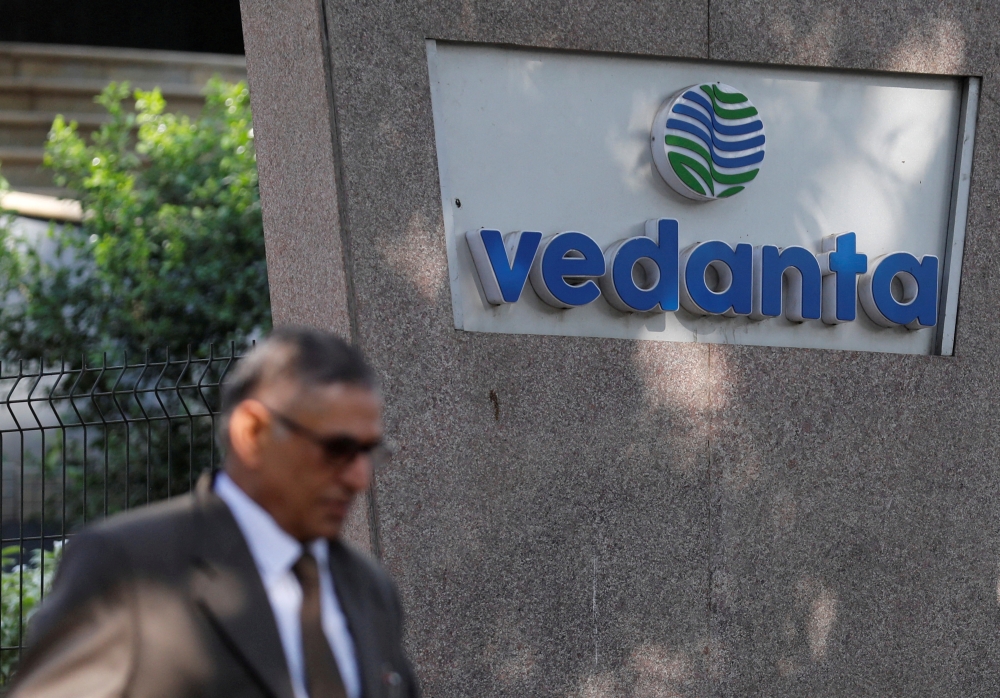 A man walks past the logo of Vedanta outside its headquarters in Mumbai, India, on January 31, 2018.  File Photo / Reuters
