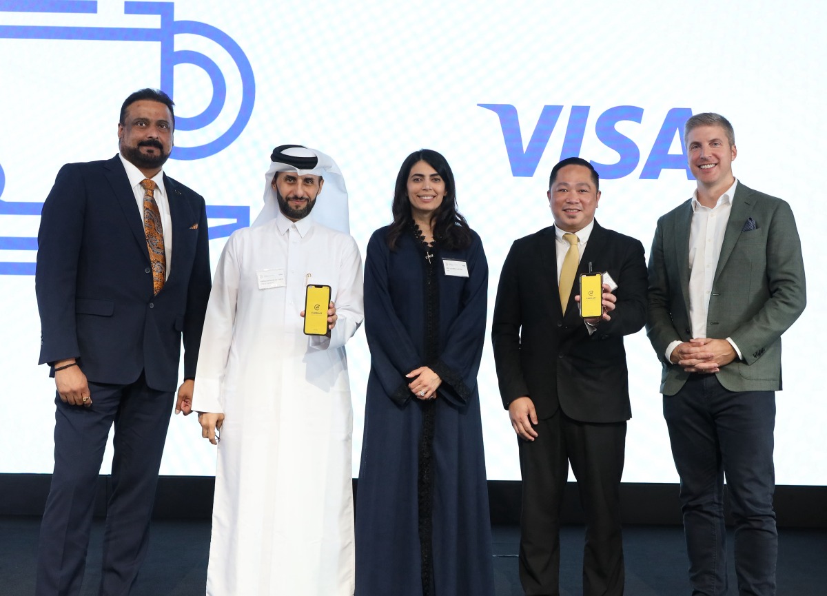 CWallet and Visa officials pose for a group photo.