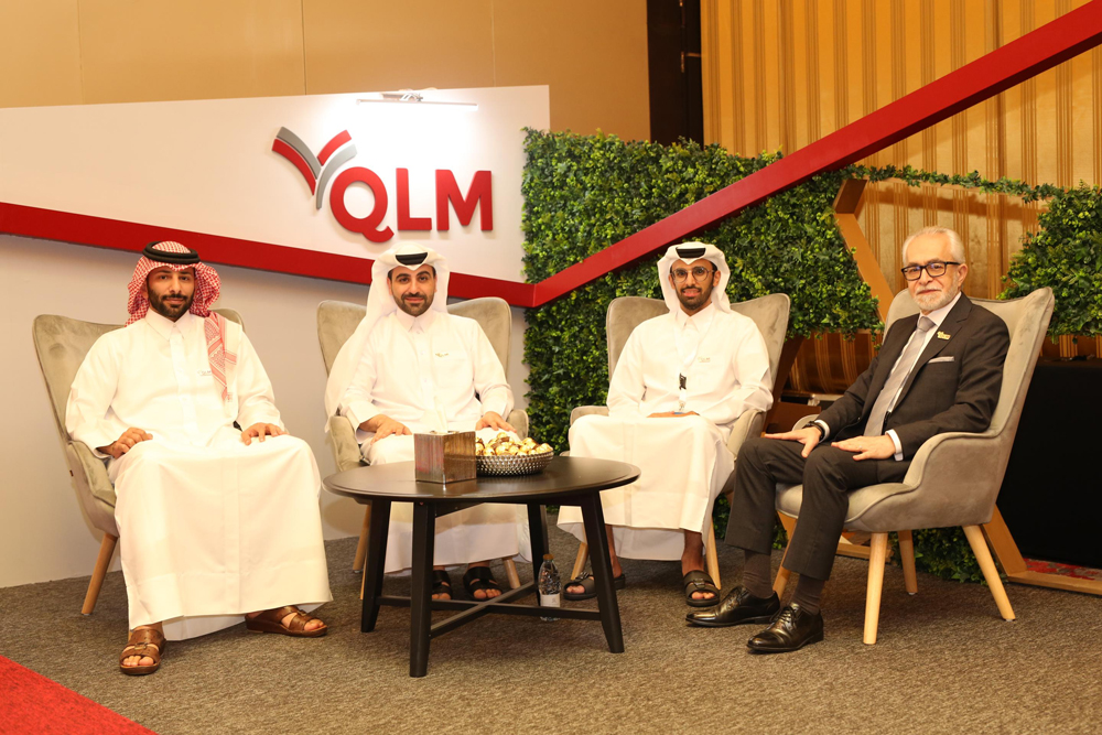 QLM representatives at the conference.