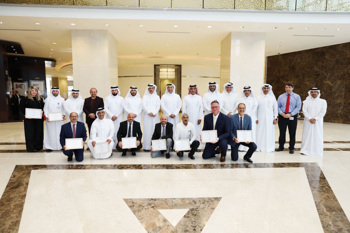 Qatargas’ officials with members of its COVID-19 Taskforce, during the recognition day ceremony, recently. 