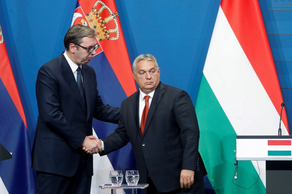 Serbian President Aleksandar Vucic and Hungarian Prime Minister Viktor Orban hold a joint news conference in Budapest, Hungary, on October 3, 2022. REUTERS/Bernadett Szabo