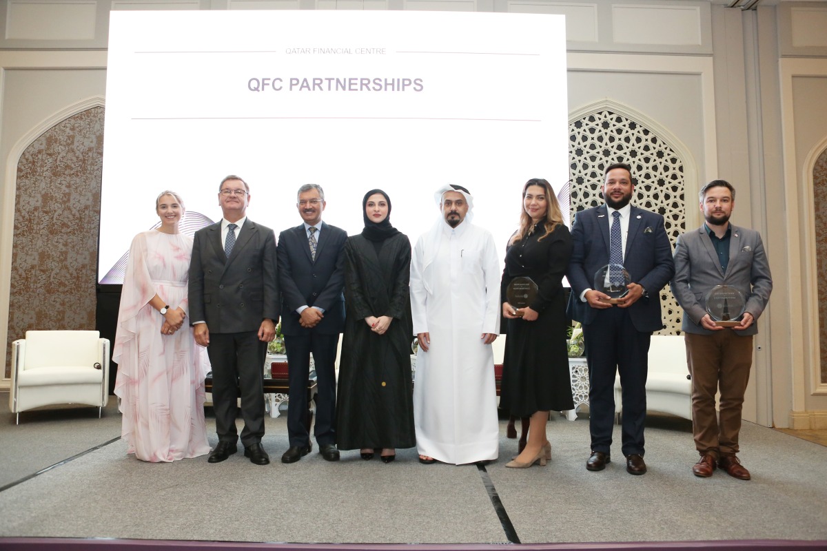 Polish Ambassador to Qatar H E Janusz Janke (2nd left), Indian Ambassador to Qatar H E Deepak Mittal (3rd left), Chief Executive Officer at QFC Yousuf Mohamed Al Jaida (4th right), and Deputy CEO & Chief Business Officer at QFC Sheikha Alanoud Bint Hamad Al Thani (4th left), with other officials, during the meeting. 