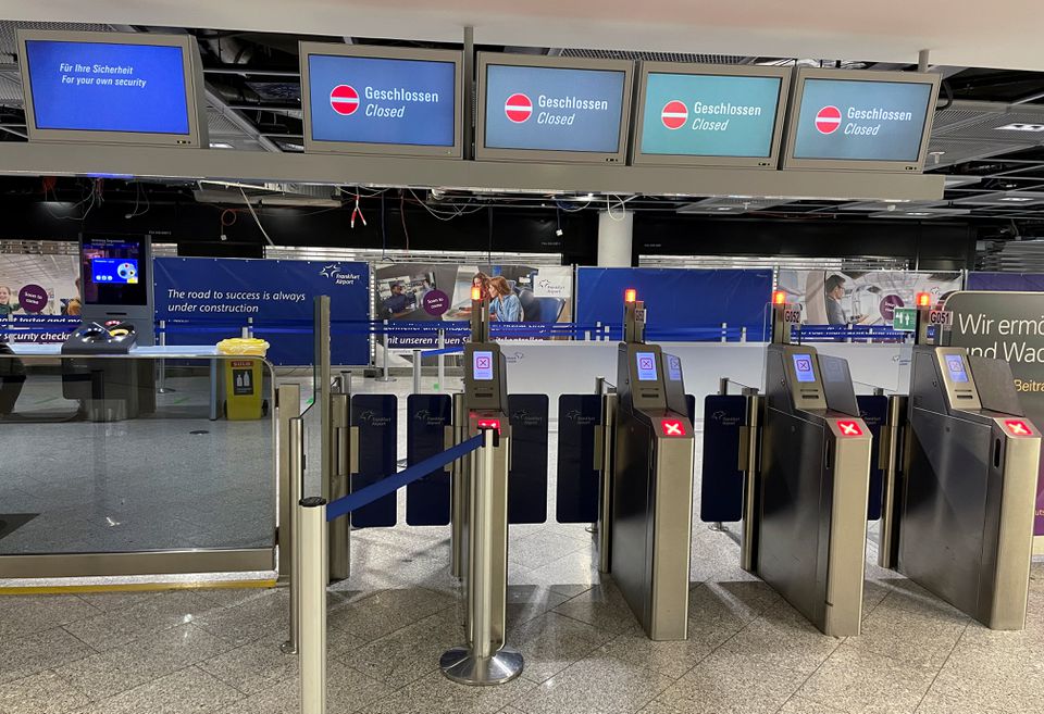 A closed security check-in at Frankfurt Airport is pictured during a strike of security staff at various German airports to put pressure on management in wage talks in Frankfurt, Germany, on March 15, 2022.  File Photo / Reuters