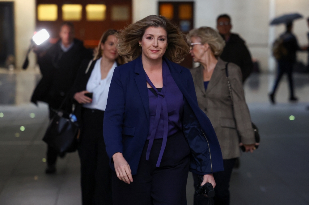 Britain's Tory Leadership candidate Penny Mordaunt walks outside BBC Broadcasting House in London, Britain, on October 23, 2022. REUTERS/Henry Nicholls