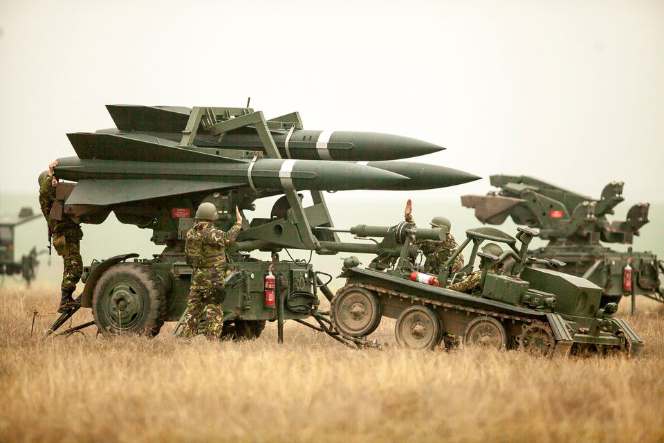 Romanian Army soldiers deploy a HAWK PIP III R ground-to-air missile launch pad during a joint military exercise with the US Army that aimed to test the interoperability of U.S. and Romanian armed forces in the event of a missile attack, near Corbu village in Constanta county, Romania, on November 8, 2016.  File Photo / Reuters