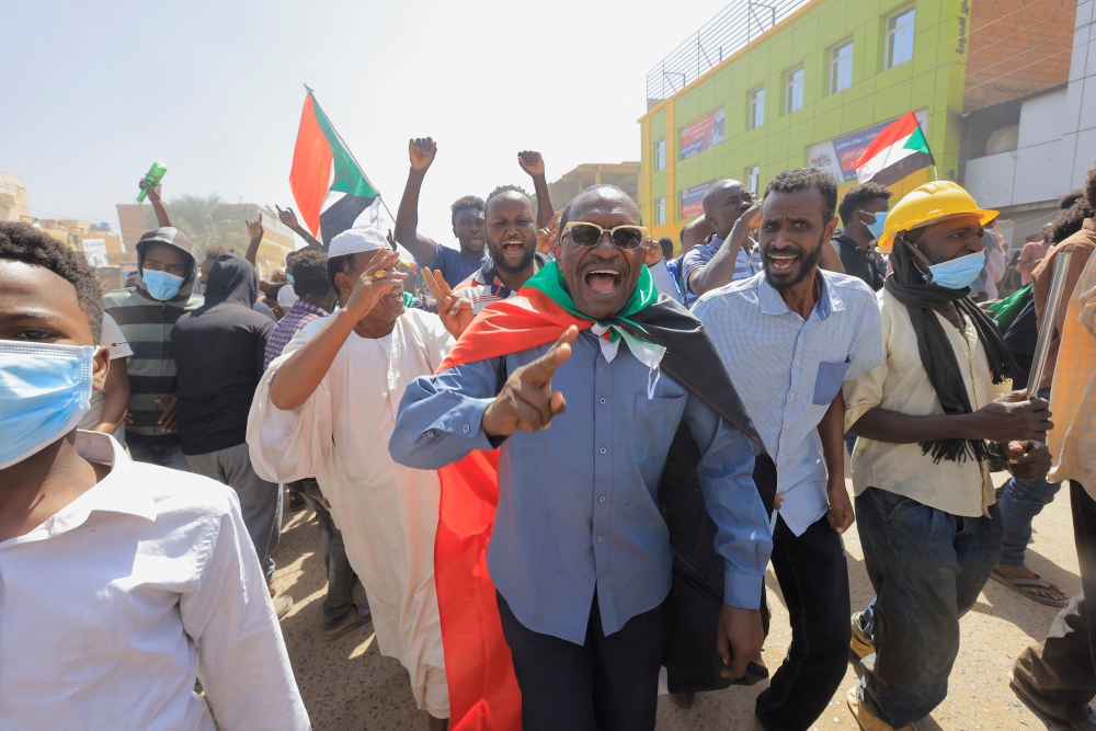 Protesters march during a rally against military rule following the last coup, in Khartoum, Sudan, on October 25, 2022. REUTERS/Mohamed Nureldin Abdallah