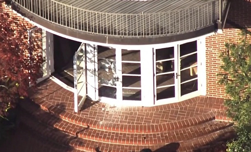 A screen grab taken from video shows damage to the home of US House Speaker Nancy Pelosi after her husband Paul Pelosi was violently assaulted in San Francisco, October 28, 2022. KGO TV via ABC via Reuters