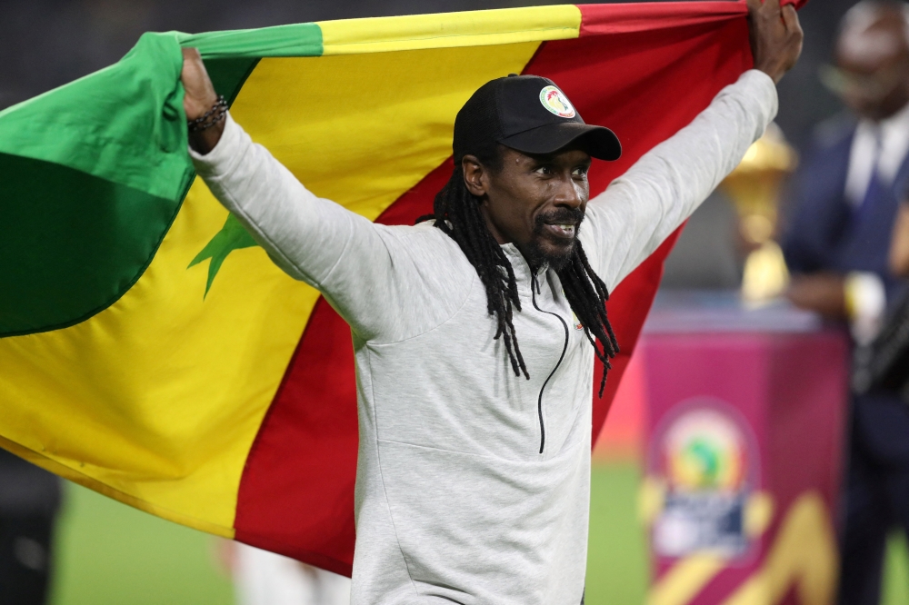 Senegal coach Aliou Cisse celebrates after winning against Egypt at the Africa Cup of Nations, at Olembe Stadium, Yaounde, Cameroon, on February 6, 2022. (REUTERS/Mohamed Abd El Ghany)
