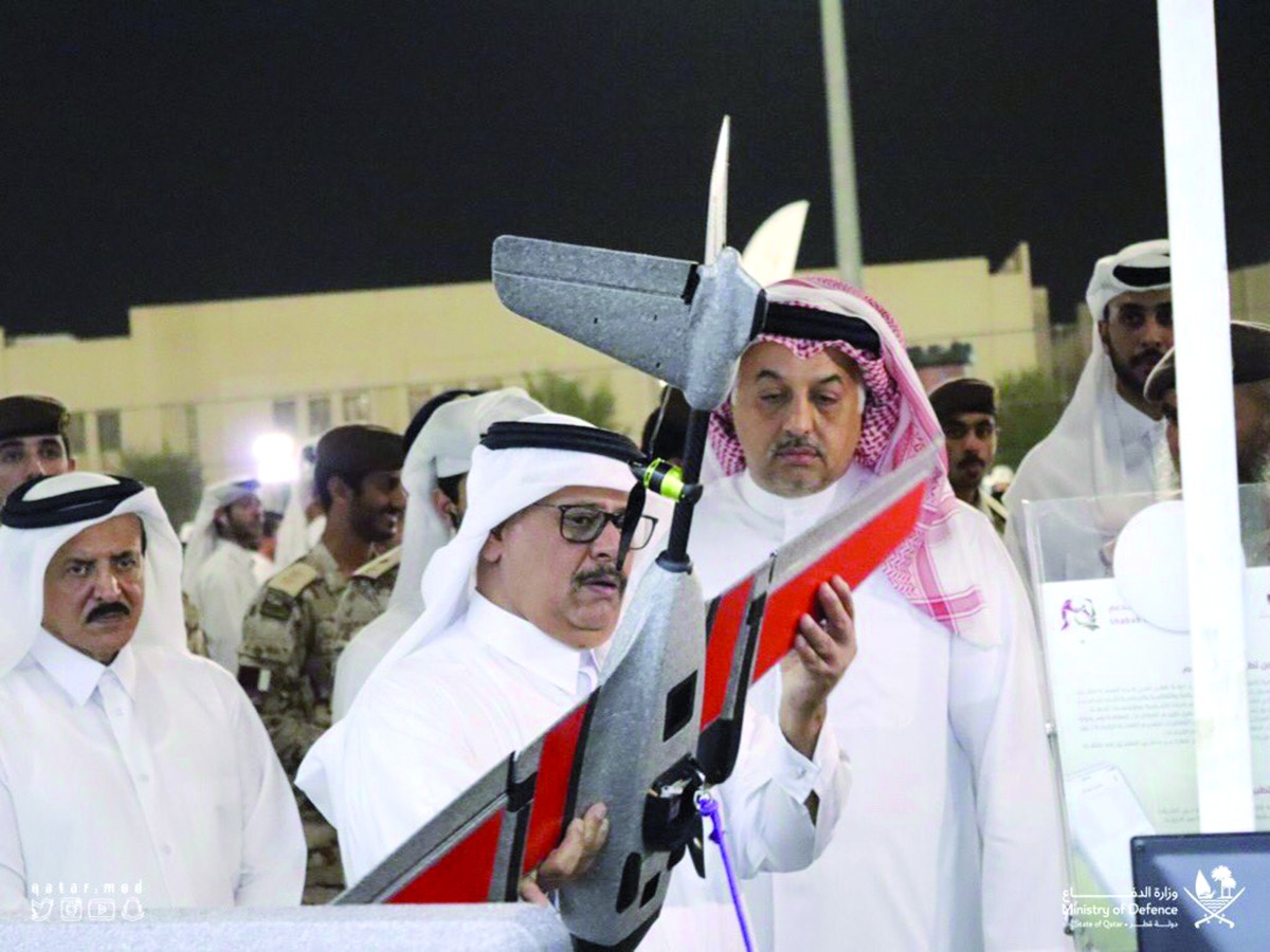 Deputy Prime Minister and Minister of State for Defence Affairs H E Dr. Khalid bin Mohammed Al Attiyah (right) inspecting an exhibit during the event.
