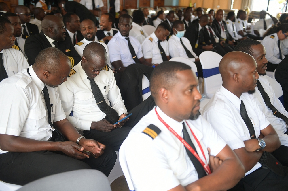 Kenya Airways pilots gather at the Kenya Airline Pilots Association (KALPA) offices, amid a strike by Kenya Airways pilots organised by-KALPA, at their offices next to Jomo Kenyatta International airport in Nairobi on November 5, 2022. (Photo by Simon MAINA / AFP)