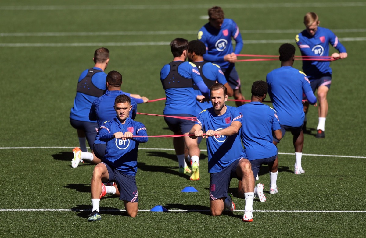 England’s Kieran Trippier and Harry Kane with team-mates during a training session recently. Reuters
