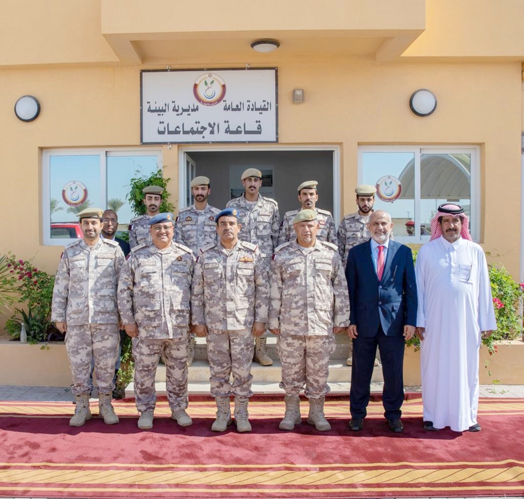 Officials posing for a group picture.