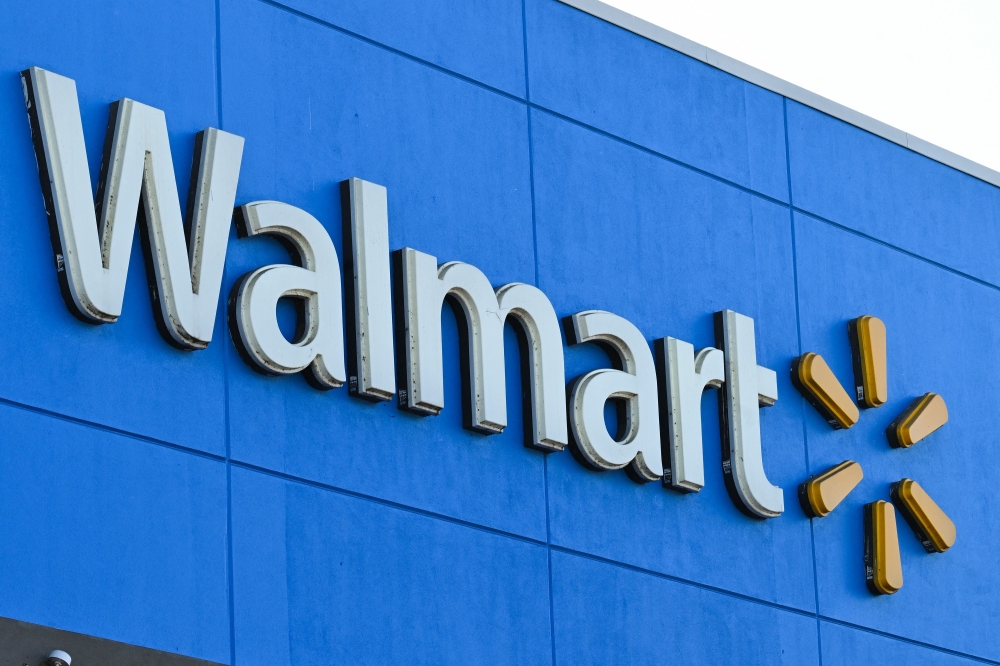 (Files) In this file photo taken on August 15, 2022, the Walmart logo is seen outside a Walmart store in Burbank, California. Photo by Robyn Beck / AFP