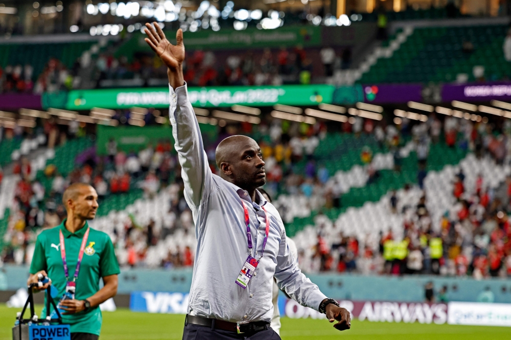 Ghana's coach Otto Addo waves after the Qatar 2022 World Cup Group H football match between South Korea and Ghana at the Education City Stadium in Al-Rayyan, west of Doha, on November 28, 2022. (Photo by Khaled DESOUKI / AFP)