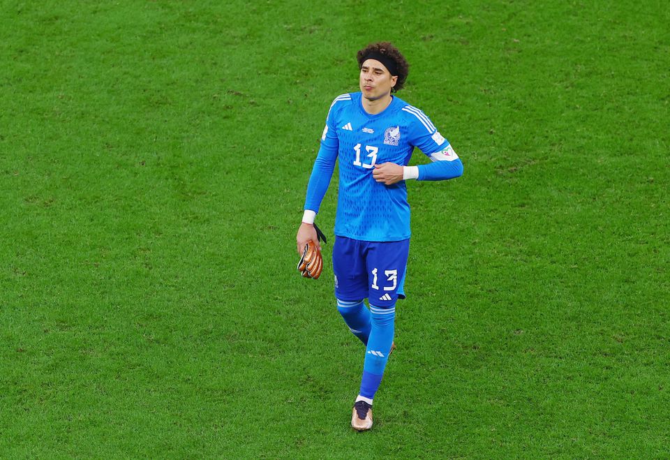 Mexico's Guillermo Ochoa looks dejected after the FIFA World Cup Qatar 2022 - Group C  match against Saudi Arabia as Mexico are eliminated from the tournament at the Lusail Stadium, Lusail, Qatar - December 1, 2022  REUTERS/Molly Darlington.