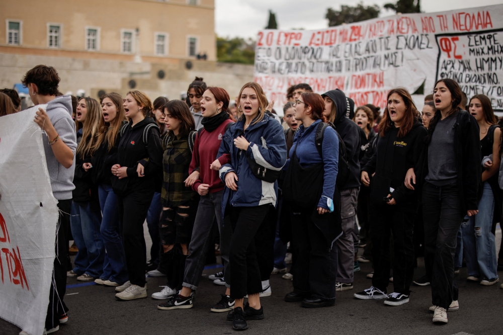 University students shout slogans during an anniversary rally marking the 2008 police shooting of 15-year-old student Alexandros Grigoropoulos, in Athens, Greece, December 6, 2022. REUTERS/Alkis Konstantinidis